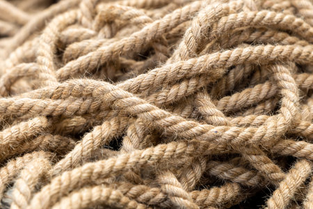 tangled lines rope dark beige background designの写真素材