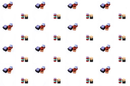 assorted gift in a multi-colored wrapper, striped, red and lilac on an isolated backgroundの写真素材