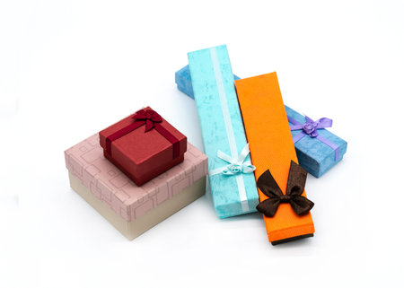 many small gift boxes of bright colors on a light background