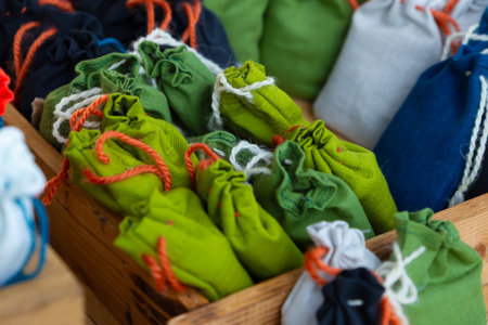 A wooden crate with green and white bagsの写真素材