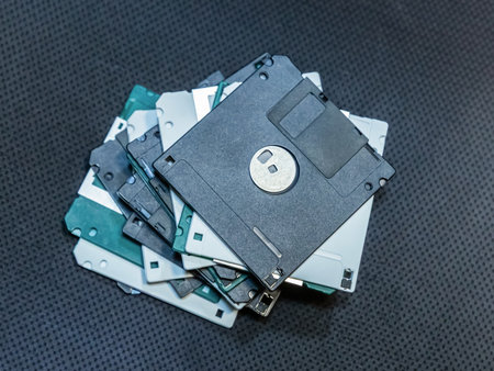 many floppy disks for storing information. symbol of storing and saving information on a computerの写真素材