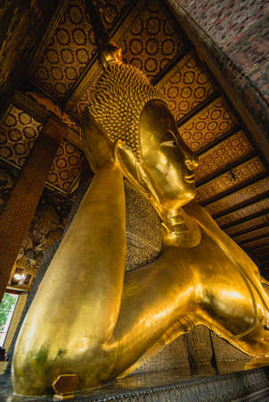 Big Buddha gold statue, Closeup golden buddha, Wat Pho at Bangkok, Thailand.の写真素材