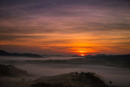 Beautiful nature sunrise Mountain Morning view point, Sun rises, at khao kho Thailand.の写真素材