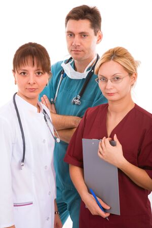 doctor with her young medical team. male and two blonde and brunette female physicians  の写真素材