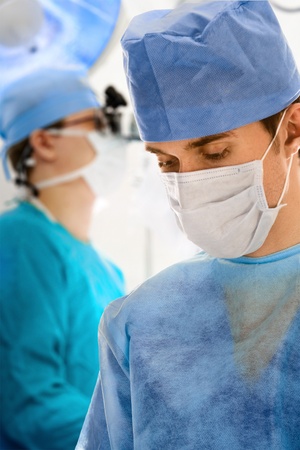 young surgeon working in operation roomの写真素材