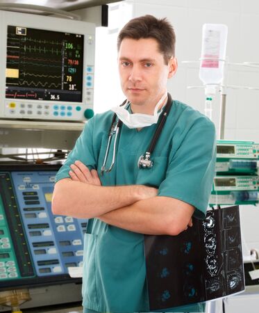 young male doctor in intensive care unitの写真素材