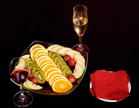 fruit with wine on tableの写真素材