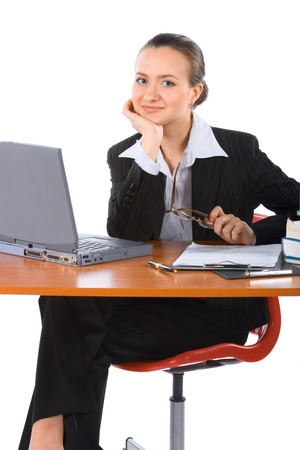 young smiling businesswoman with laptop and spectaclesの写真素材
