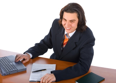 smiling young businessman with laptopの写真素材