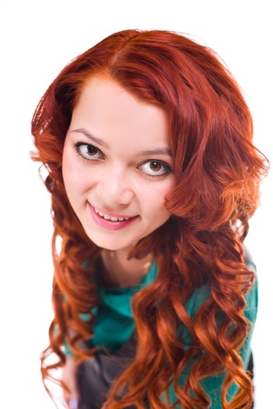 young attractive woman with long rust-coloured hair. image with small depth of fieldの写真素材