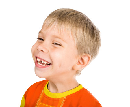 happy smiling five-year-old boy without one tooth