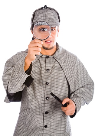 asian sherlock holmes with pipe and magnifying glassの写真素材