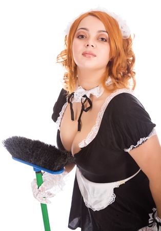 Young attrective charwoman with brushの写真素材