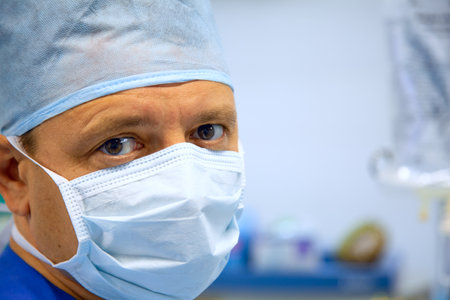 Mature male surgeon in operation roomの写真素材