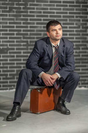 Businessman with suitcase の写真素材