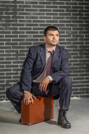 Businessman with suitcase の写真素材
