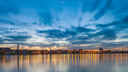 Evening cityscape with river