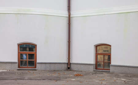 Facade of an old antique houseの写真素材