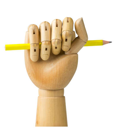 Wooden hand with pencil isolated on a white backgroundの写真素材