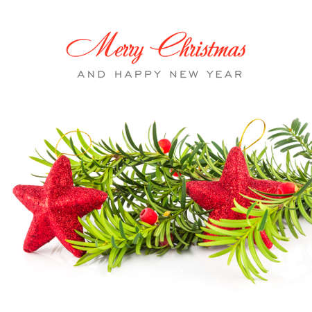 Christmas balls and fir on white backgroundの写真素材