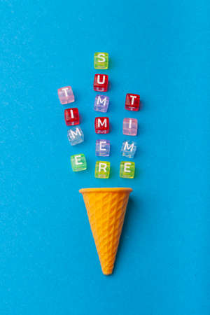 miniature Ice cream on a colorful background. Copy space. Summer time concept.の写真素材