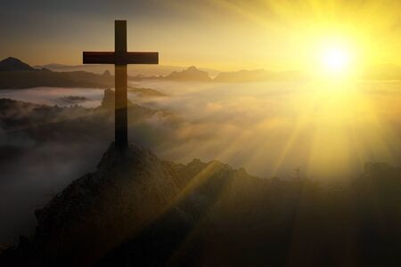 The crucifix symbol of Jesus on the mountainの写真素材