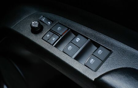 Switch on the side of the windshield and the mirror adjustment switchの写真素材