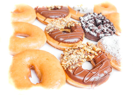 Donuts arranged on a white background