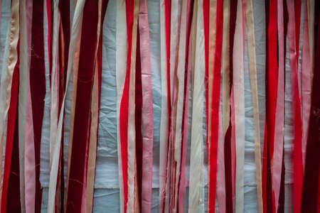 Striped cheesecloth background red colorの写真素材