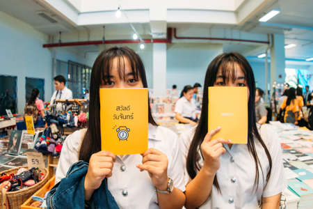 Phitsanulok, Thailand / 11, 14, 2018: Undergraduate students in Phitsanulok are buying books and learning materials in Book Fair.のeditorial素材