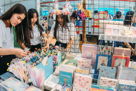 Phitsanulok, Thailand / 11, 14, 2018: Undergraduate students in Phitsanulok are buying books and learning materials in Book Fair.のeditorial素材