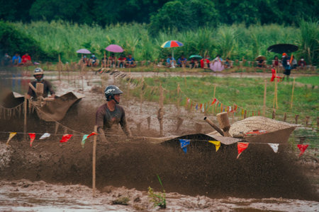 Phitsanulok City, Thailand - 5222022: Thai local athletes Compete for speed with a small tractor for agriculture.のeditorial素材