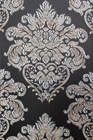 A damask upholstery fabric. A vintage pattern