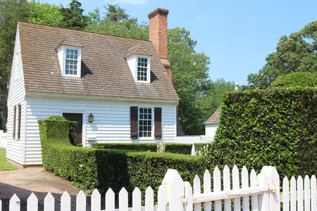 Colonial style house and garden with white fence, Virginia, USAのeditorial素材
