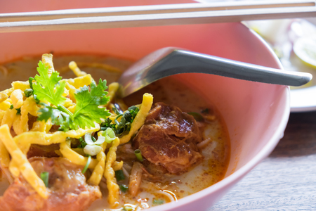 Khao Soi, Thai Northern Style Curried Noodle Soup with Beef.の写真素材