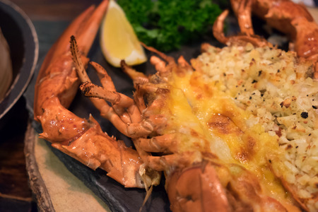 Lobster gilled with cheese and garlic butter.の写真素材