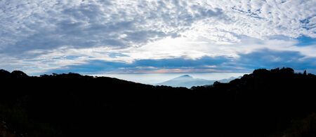 Sunrise in the morning and mountain views, Light at dawn, The color of the sky, Rising sun, Doi Inthanon, Chiangmai, Thailand. (panorama)の写真素材