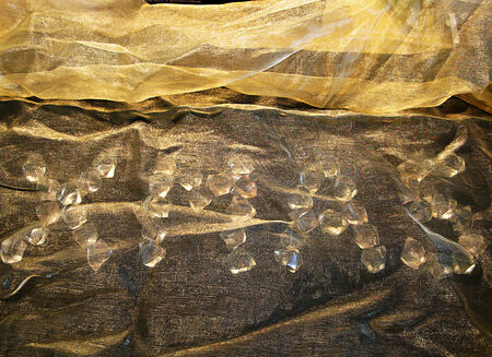 Background of golden shinny chiffon fabric with letters xmasの写真素材