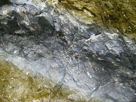 Background of  cracked brown and gray rock structureの写真素材