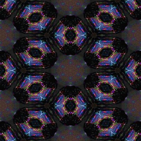 Abstract kaleidoscopic mosaic of glass shards reminiscent of stained glassの写真素材