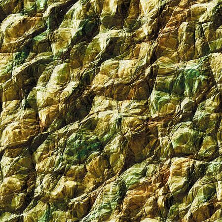 Background of cracked brown and green rock stuctureの写真素材