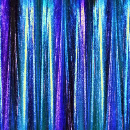 Abstract glittering background of velvet stripes resembling tissue. Blue, purple, yellow and black background foldedの写真素材
