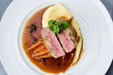 grilled tuna with baby carrot and mashpotatoの写真素材