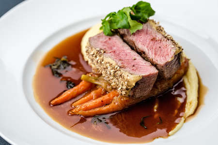 grilled tuna with baby carrot and mashpotatoの写真素材