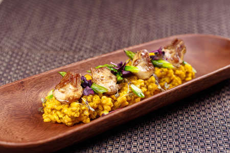 Traditional spanish rice with artichokes and asparagus.の写真素材