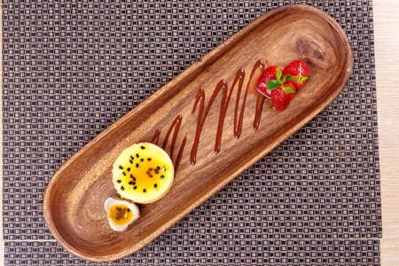 Dessert Panna Cotta with passion fruit strawberry and mint, Italian dessertの写真素材