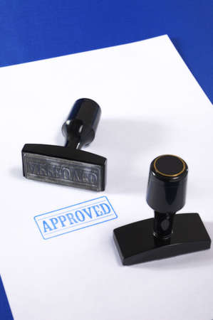 Stamp on a blank page on a dark blue background の写真素材