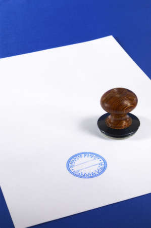 Stamp  on a blank page (blank space to add your text)の写真素材