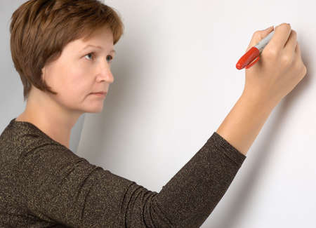  The woman with a marker at the stand for notesの写真素材