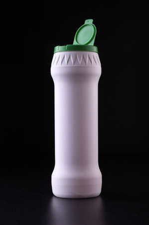 detergent  on a dark grey backgroundの写真素材